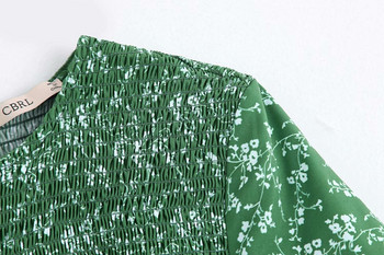 Rochie lejeră cu decolteu oval și mâneci scurte de culoare și model verde