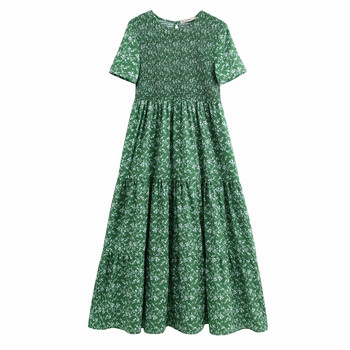 Rochie lejeră cu decolteu oval și mâneci scurte de culoare și model verde