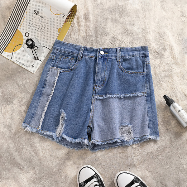 Blugi moderni scurti de dama cu talie inalta si motiv rupt