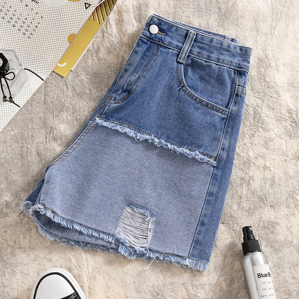 Blugi moderni scurti de dama cu talie inalta si motiv rupt