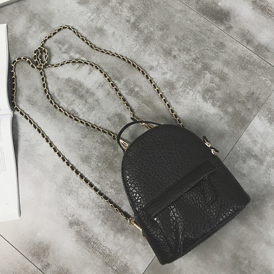 Rucsac de dama modern din piele ecologica cu manere metalice de culoare neagra