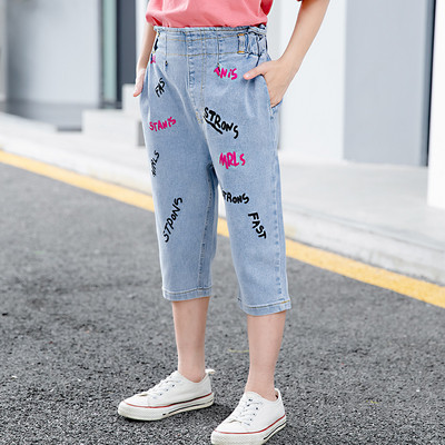 Blugi de copii actuali cu inscriptii si buzunare pentru fete