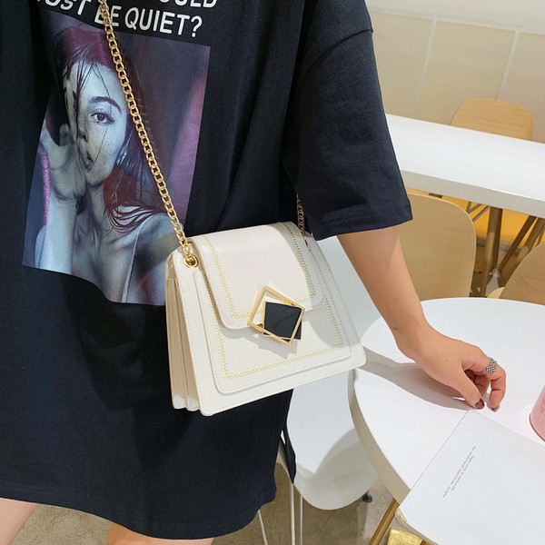 Geanta de dama moderna cu maner lung metalic in mai multe culori