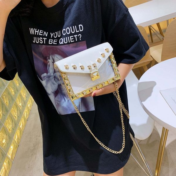 Geanta de dama moderna cu elemente metalice in mai multe culori