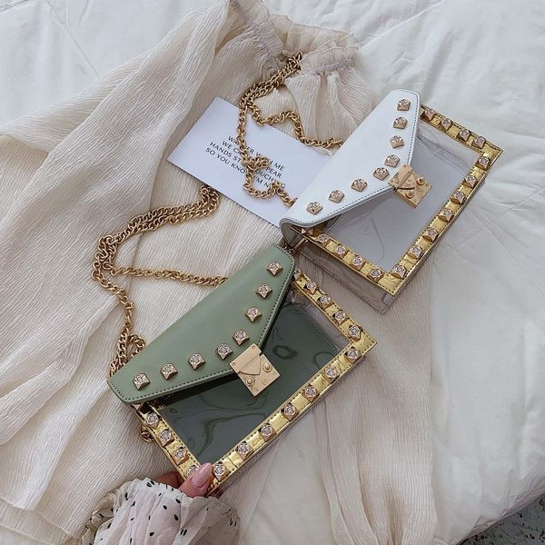 Geanta de dama moderna cu elemente metalice in mai multe culori