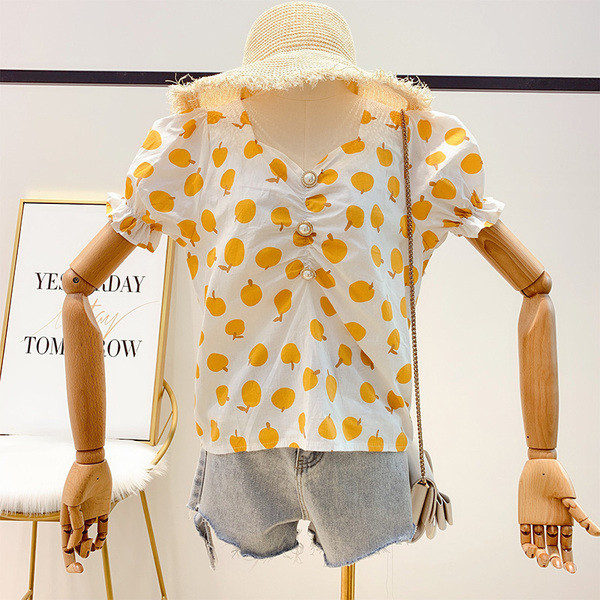 Bluză de damă cu mâneci scurte și decor cu perle