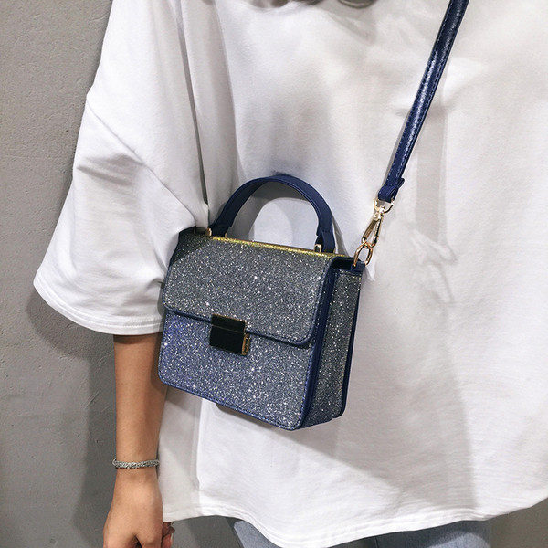 Geanta de dama moderna cu efect stralucitor in rosu si albastru