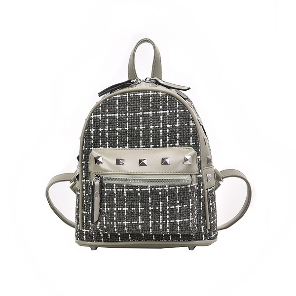 Rucsac modern de dama cu buzunar frontal si elemente metalice in mai multe culori