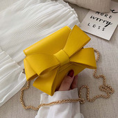 Модерна дамска чанта с панделка и метална дръжка в няколко цвята