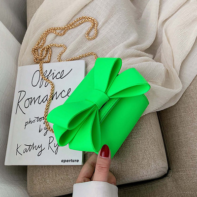 Модерна дамска чанта с панделка и метална дръжка в няколко цвята