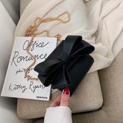 Модерна дамска чанта с панделка и метална дръжка в няколко цвята