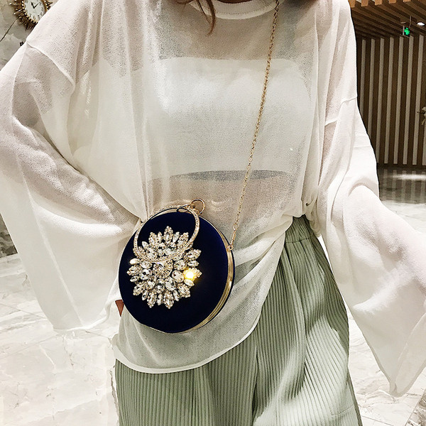 Geanta de dama eleganta in forma rotunda cu pietre in mai multe culori