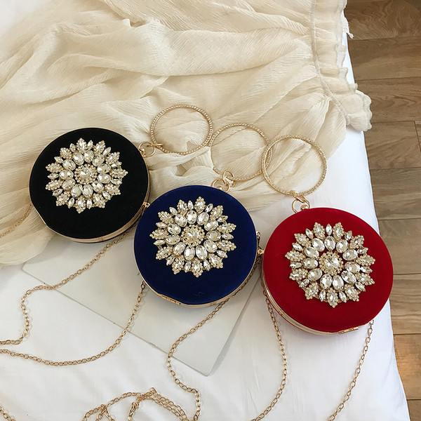 Geanta de dama eleganta in forma rotunda cu pietre in mai multe culori