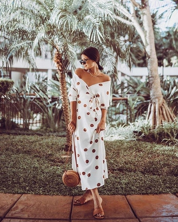 Modern női pöttyös ruha fehér színben