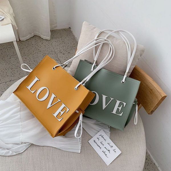 Geanta casual dama din piele ecologica cu inscriptie in mai multe culori