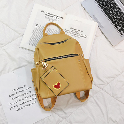 Női alkalmi hátizsák öko bőrből, elülső zsebekkel több színben