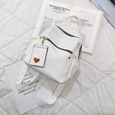 Női alkalmi hátizsák öko bőrből, elülső zsebekkel több színben