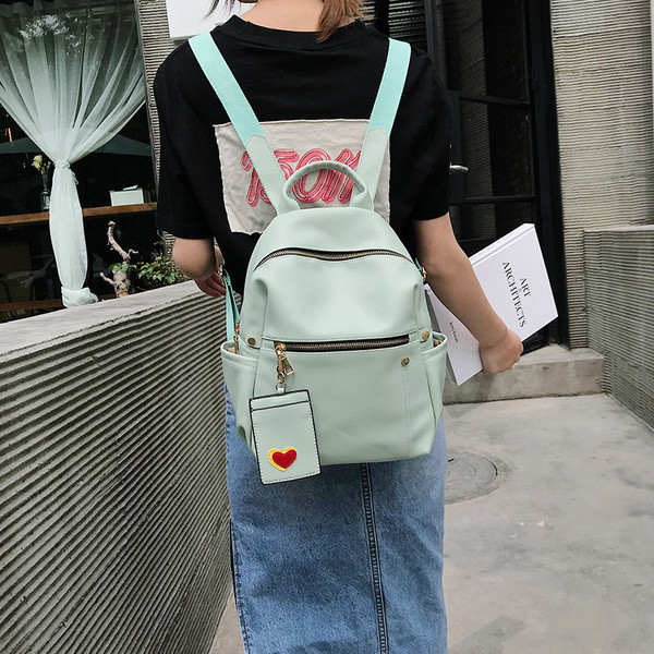 Női alkalmi hátizsák öko bőrből, elülső zsebekkel több színben