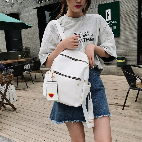 Női alkalmi hátizsák öko bőrből, elülső zsebekkel több színben