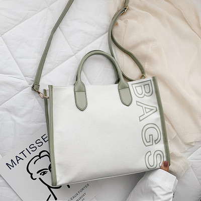 Női alkalmi táska rövid és hosszú füllel, több színben