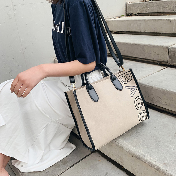 Női alkalmi táska rövid és hosszú füllel, több színben