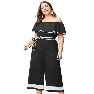 Κομψή γυναικεία ολόσωμη φόρμα  με κορδέλασε μαύρο και κίτρινο χρώμα