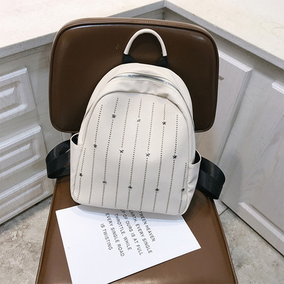 Rucsac modern de dama cu elemente metalice in alb, negru si roz