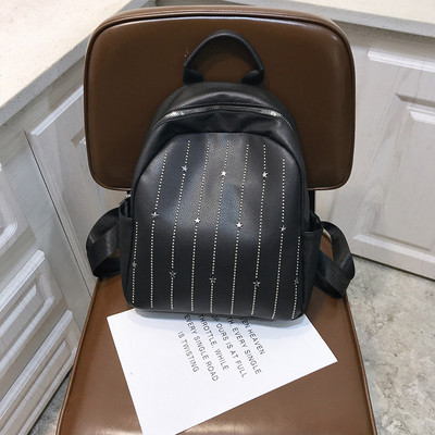 Rucsac modern de dama cu elemente metalice in alb, negru si roz