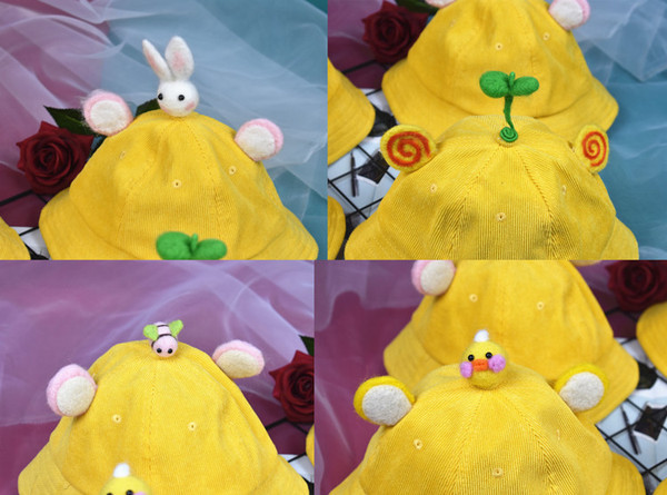 Palarie moderna pentru copii cu diverse elemente 3D in galben