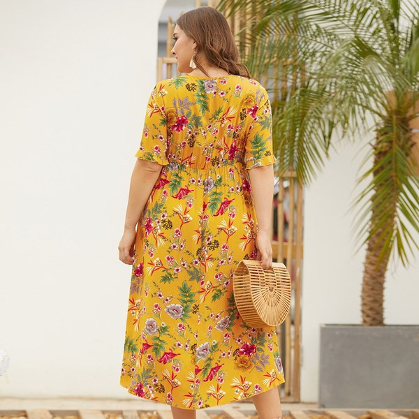 Stílusos női ruha aszimmetrikus modell virágmintával