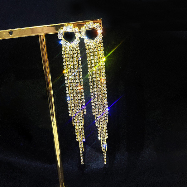 Cercei lungi de dama de culoare auriu si argintiu-cu pietre