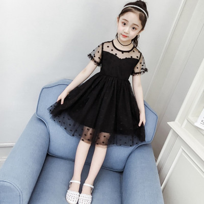 Стилна детска рокля разкроен модел-в бял и черен цвят