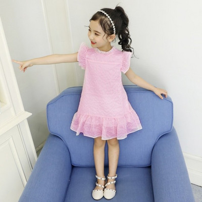 Актуална детска рокля разкроен модел в розов цвят