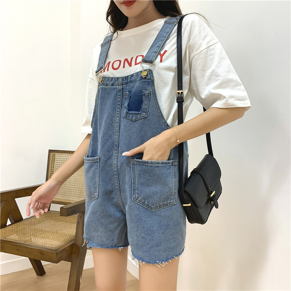 Salopetă de damă modernă din denim cu buzunare în albastru