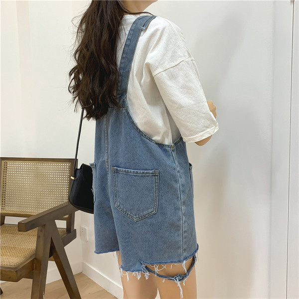 Salopetă de damă modernă din denim cu buzunare în albastru