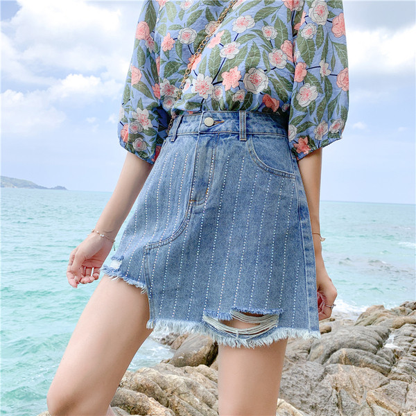 Fusta de dama moderna din denim cu motive rupte si marimi pana la 5XL