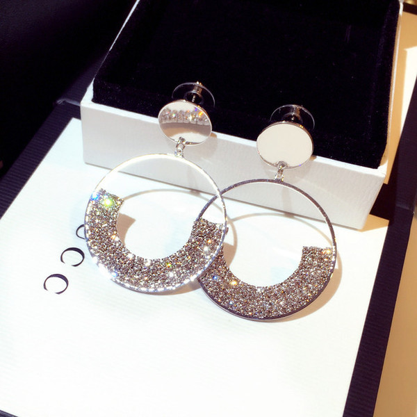 Cercei de dama de culoare auriu si argintiu-cu pietre