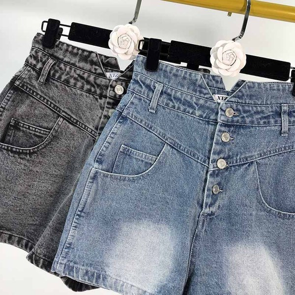 Blugi scurti de dama cu talie inalta cu nasturi in albastru si negru