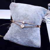 Bratara eleganta de dama de culoare aurie cu pietre