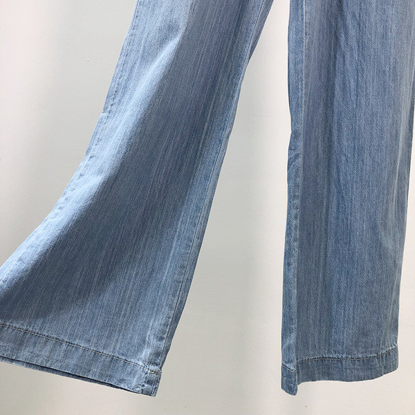 Pantaloni largi de damă din denim cu legături în talie în albastru