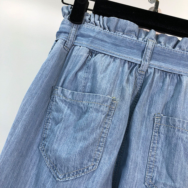 Pantaloni largi de damă din denim cu legături în talie în albastru