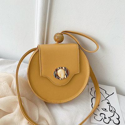 Geanta de dama in forma rotunda cu o geanta scurta si una lunga