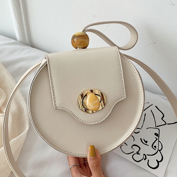 Geanta de dama in forma rotunda cu o geanta scurta si una lunga