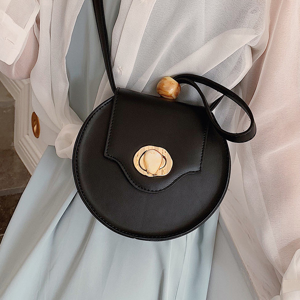 Geanta de dama in forma rotunda cu o geanta scurta si una lunga