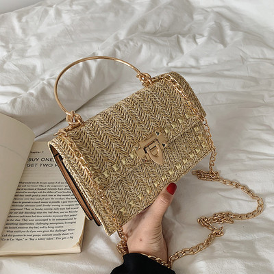 Geanta de dama eleganta cu decor metalic in doua culori