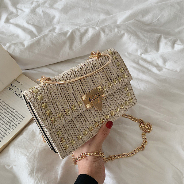 Geanta de dama eleganta cu decor metalic in doua culori