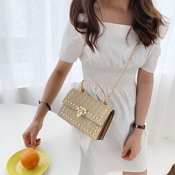 Geanta de dama eleganta cu decor metalic in doua culori