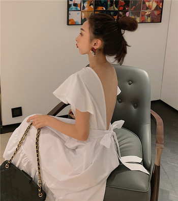 Model de rochie de dama cu croiala moderna in alb si negru