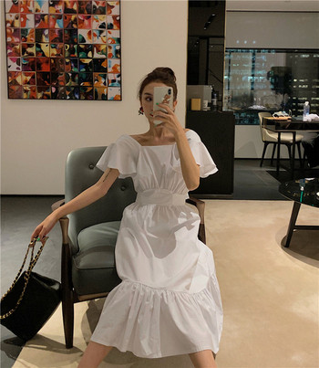 Model de rochie de dama cu croiala moderna in alb si negru