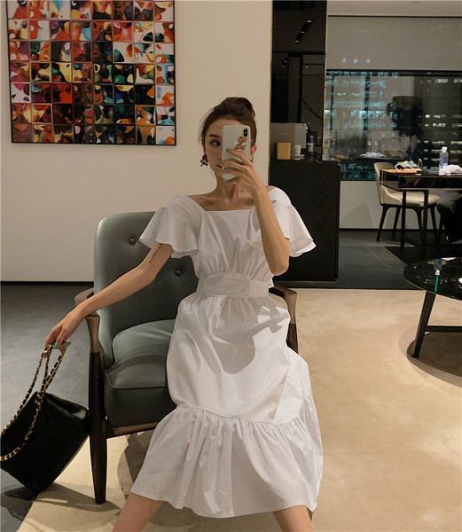 Model de rochie de dama cu croiala moderna in alb si negru